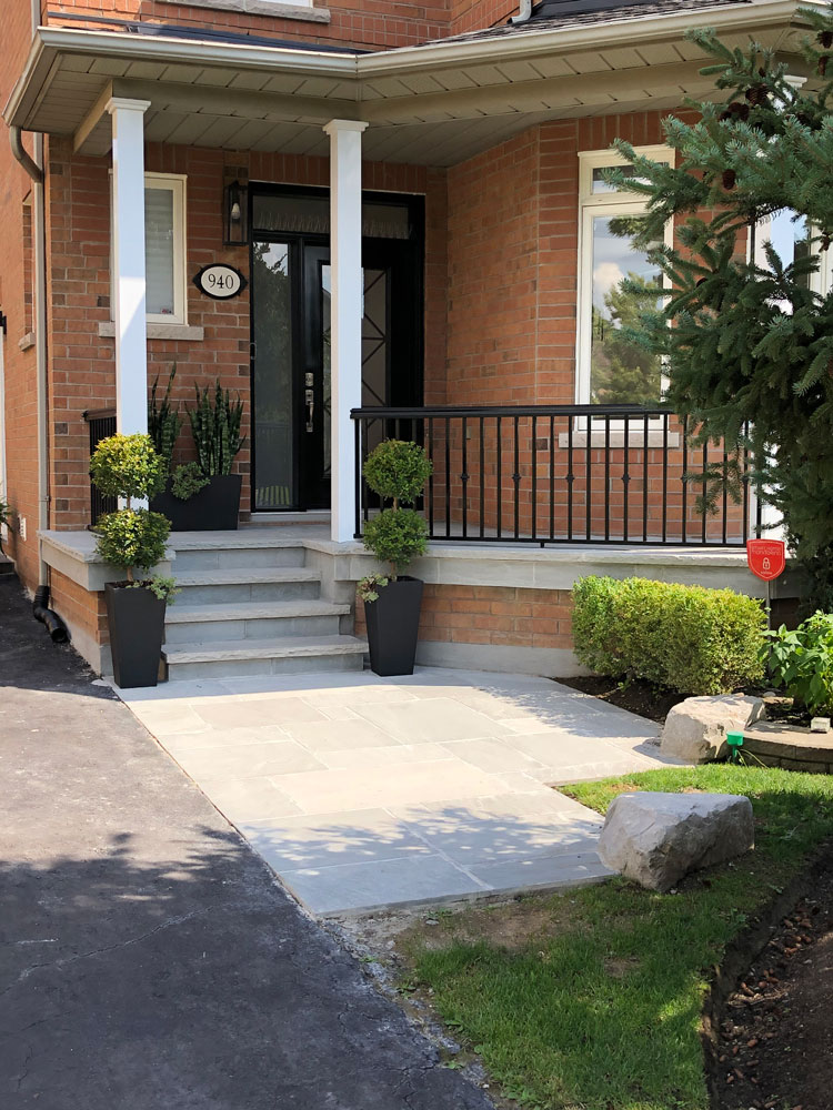 Stone-finished front steps, porch and walkway featured on Hamilton Masonry’s website